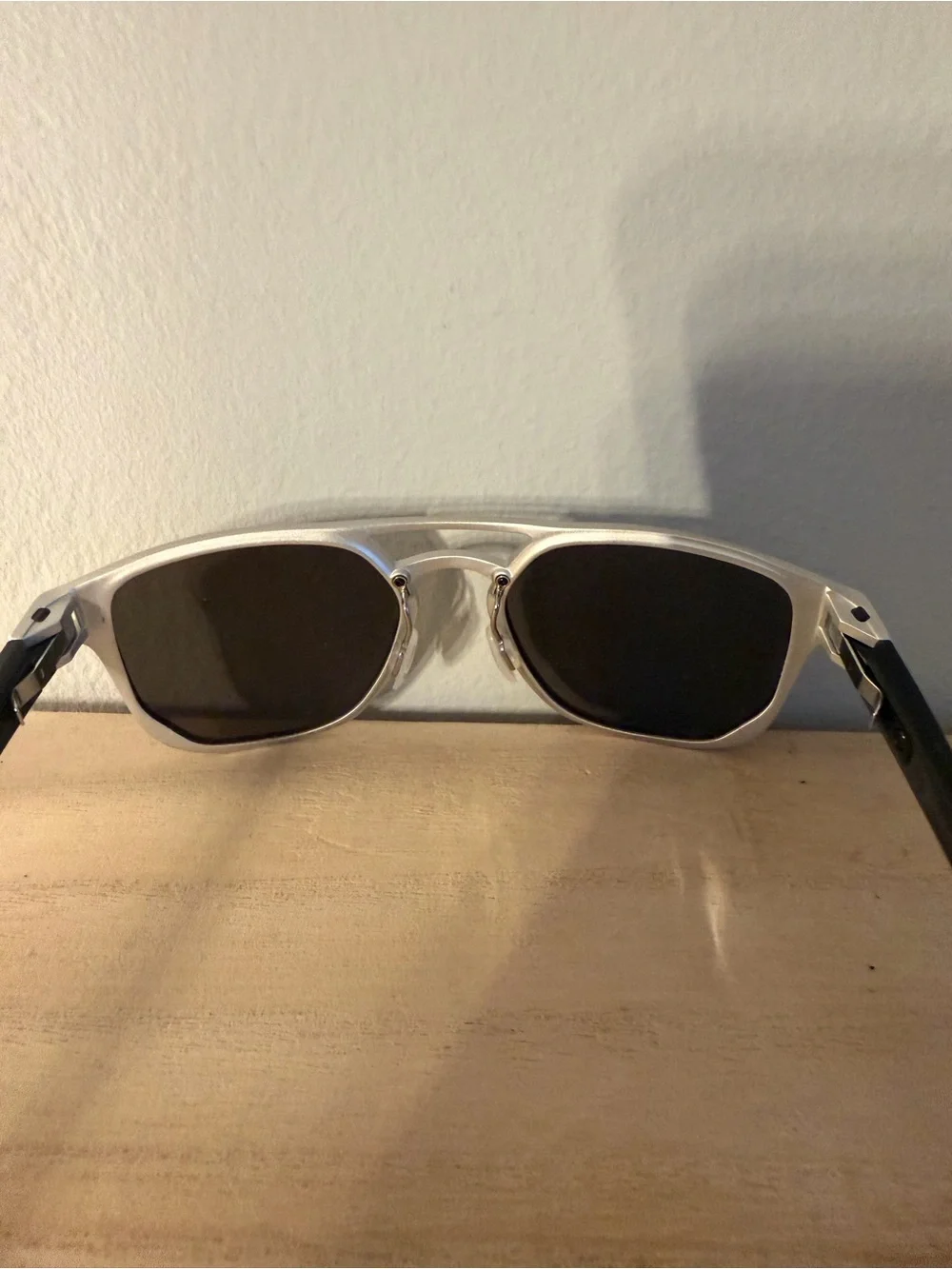 Oakley Latch Alpha Silver Framed Sunglasses with Dark Lenses
